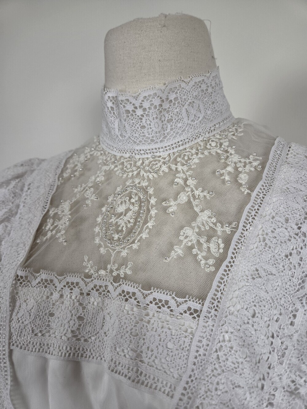 Victorian-Inspired White Lace Bridal Gown with High Neck and Sheer Puff Sleeves - Picture 10 of 13